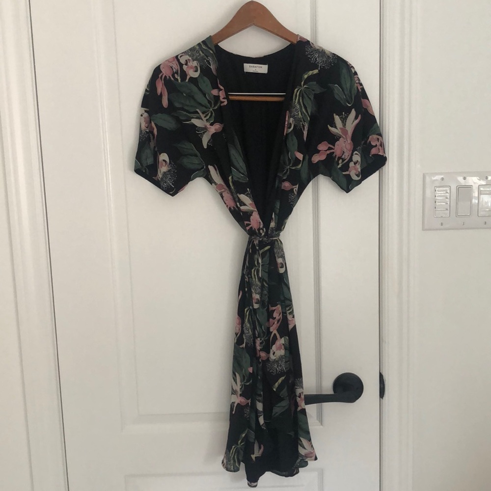 Beautiful lightly worn Babaton wrap dress size Small floral pattern black